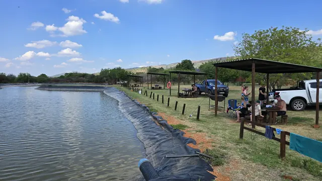 The De Wildt fishing dam surrounded by bushveld.